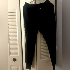 Woman’s black Greys Anatomy jogger style scrub pants